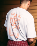 Back view of a white Jägermeister T-shirt featuring a large Jägermeister label-inspired graphic print.
