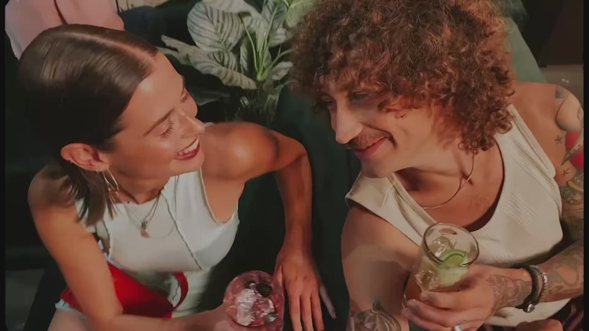 Two people cheering with Jägermeister.