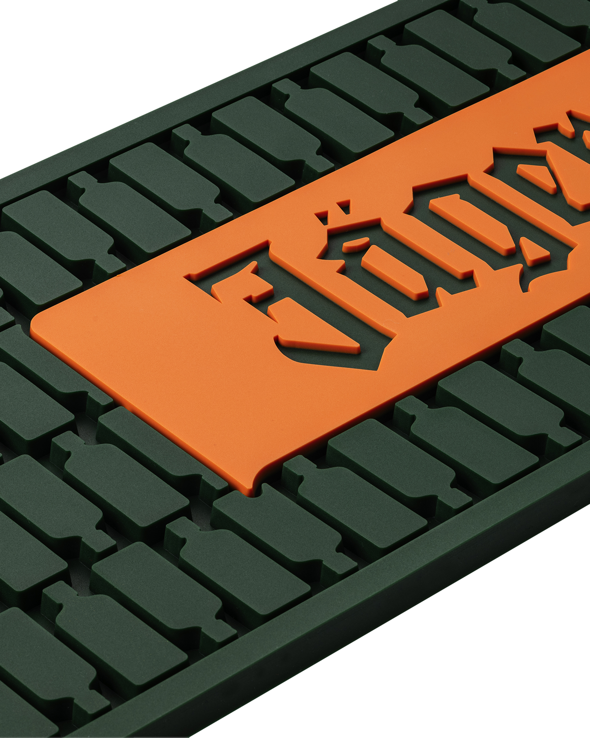 Close up of green and orange mat with Jägermeister logo 