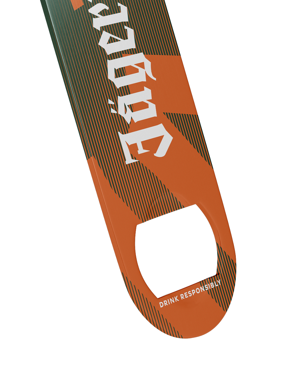 Close-up of the Jägermeister bottle opener with orange grip end, striped design, white Jägermeister logo, and "Drink Responsibly" lettering.
