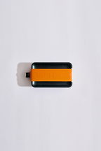 Green and orange cooling device with 'Jägermeister' branding 