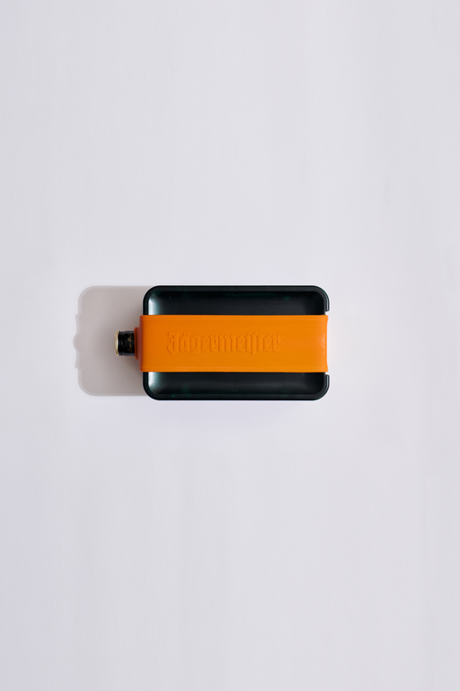 Green and orange cooling device with 'Jägermeister' branding 