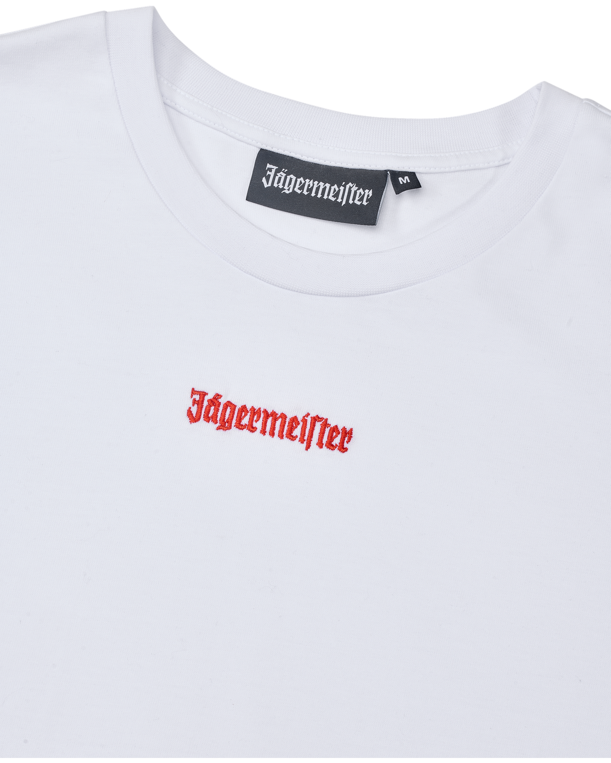 Witte cropped tee met oranje Jägermeister-logo.