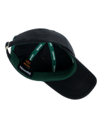 Black cap with green interior and visible Jägermeister brand logo.