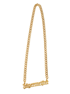 Gold chain necklace with 'Jägermeister' pendant.