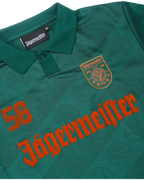 Close-up of a green jersey with Jägermeister branding.