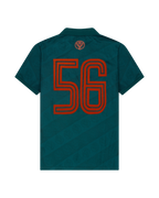 Green Jägermeister jersey with an orange '56' on the back.