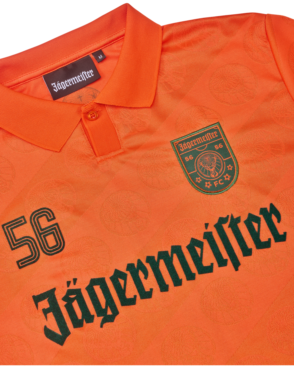 Orange jersey with Jägermeister branding.