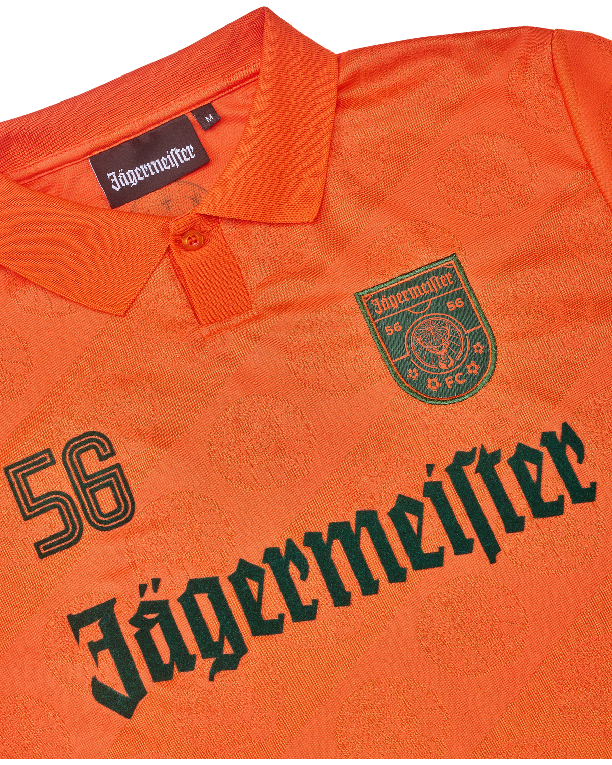 Orange jersey with Jägermeister branding.