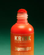 Orange Krink marker with Jägermeister branding on green background