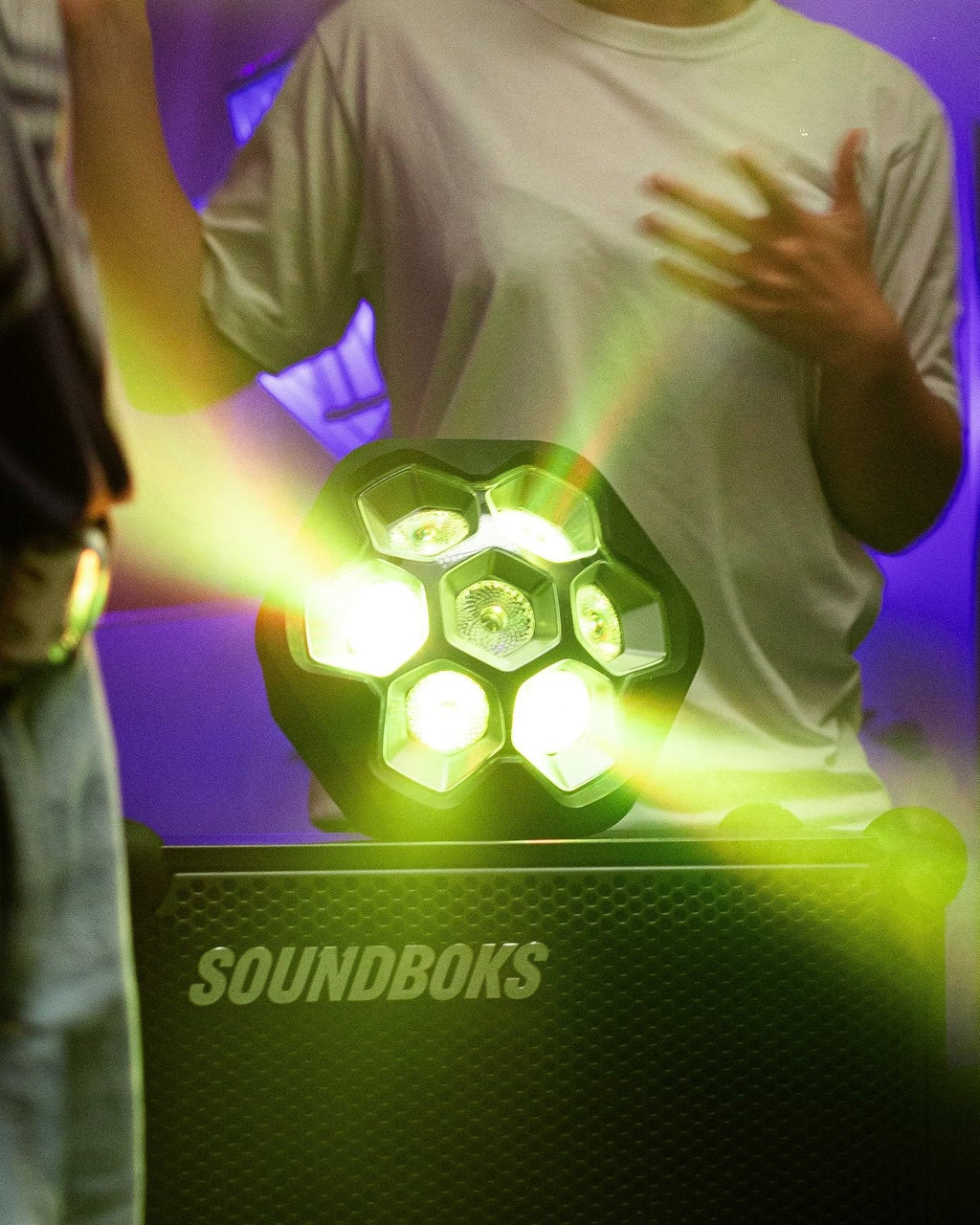 SOUNDBOKS speaker with glowing LIGHTBOKS on a dark background
