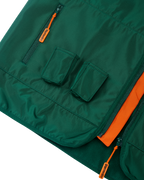 Green vest with orange accents and two small pockets for Jägermeister Minis.