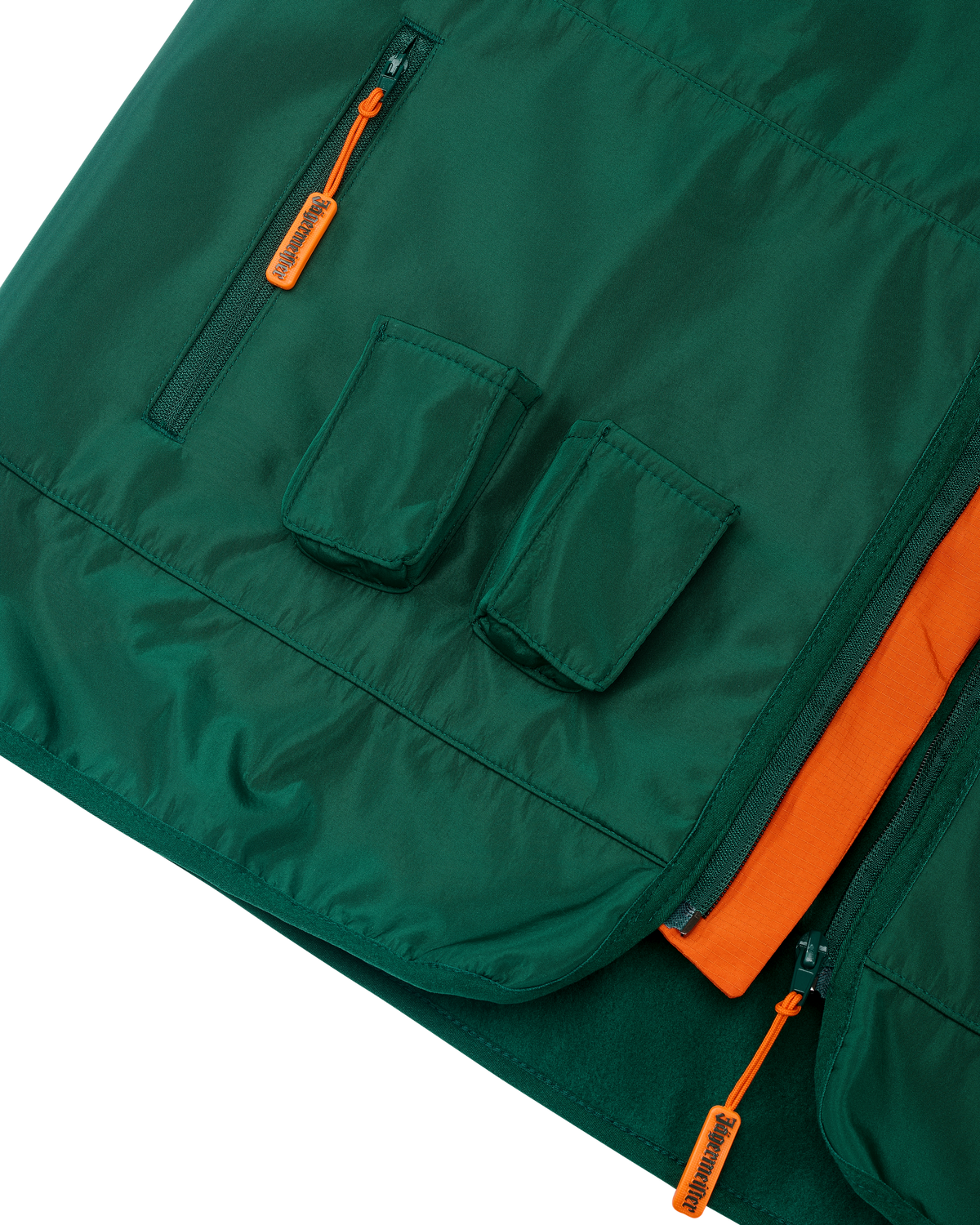 Green vest with orange accents and two small pockets for Jägermeister Minis.