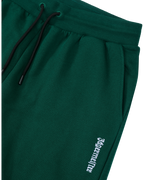 Green Jägermeister sweatpants with a white logo.
